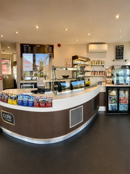 Cafe Repleat counter, menu boards and display cases