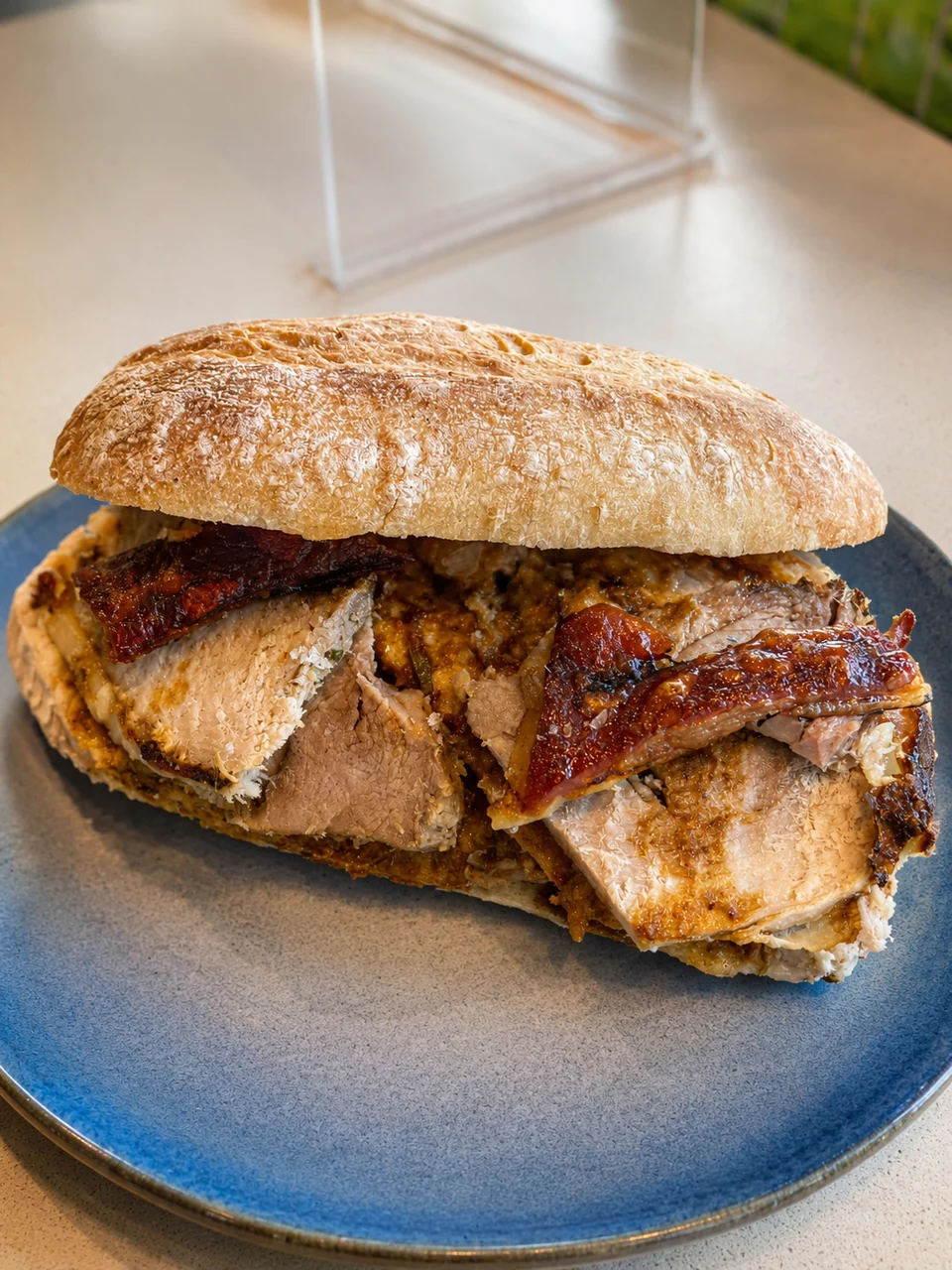 A filled baguette with roasted fillings